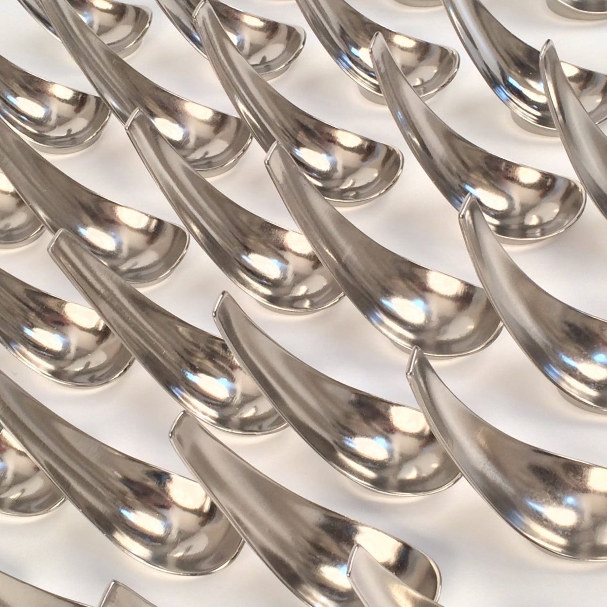 batch of stainless steel amuse bouche spoons