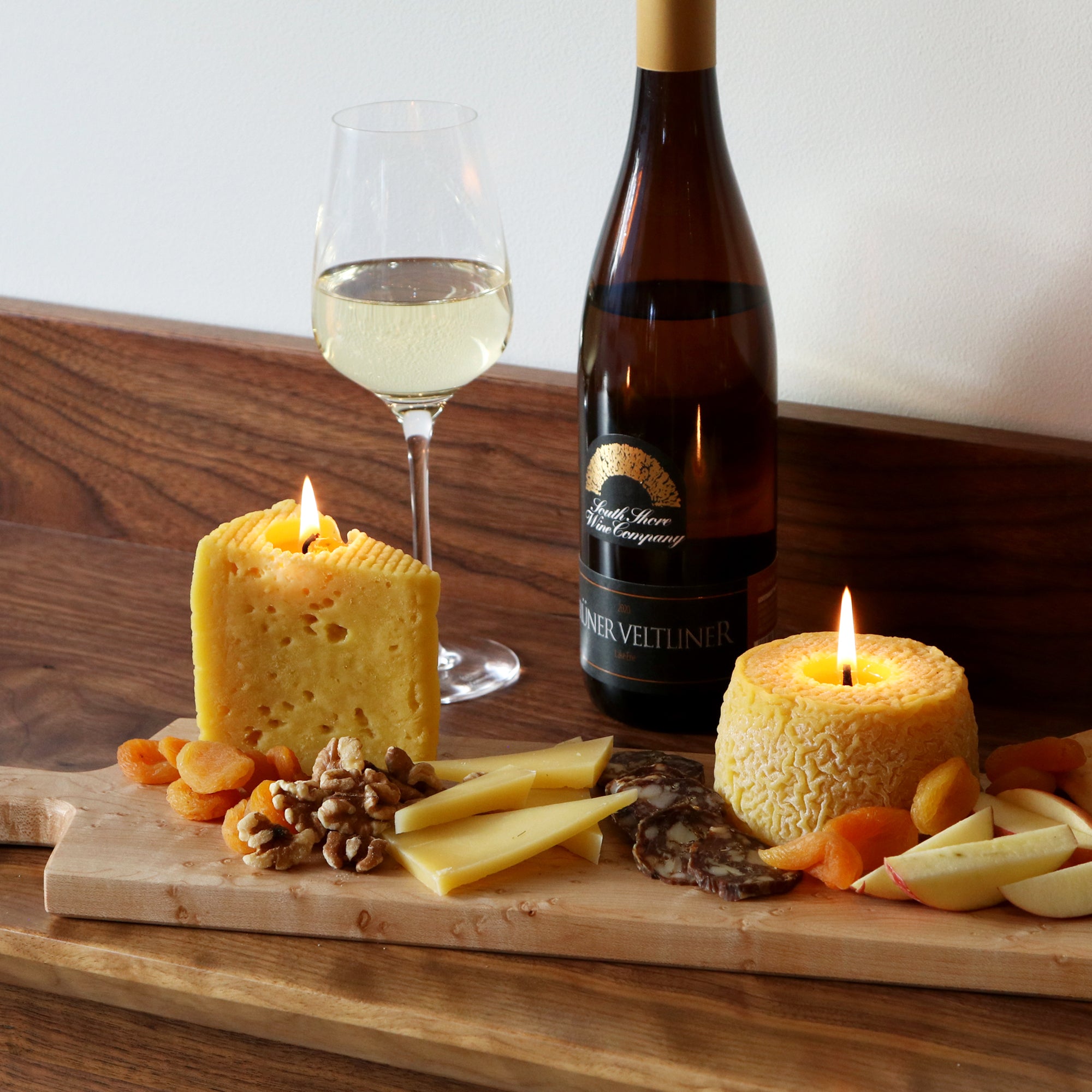 wine, cheese and charcuterie with cheese candles