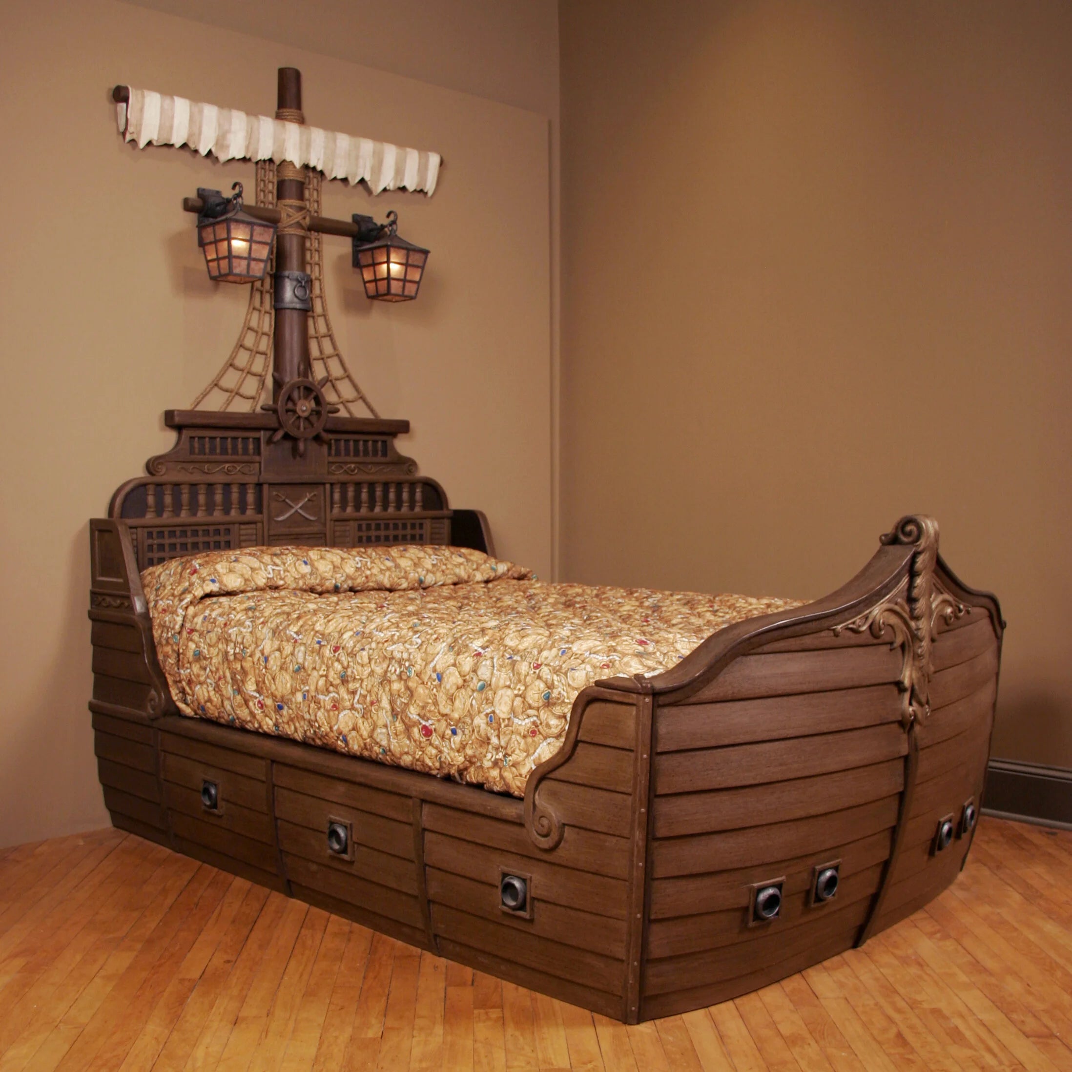 Wooden ship bed with decorative elements in a room.