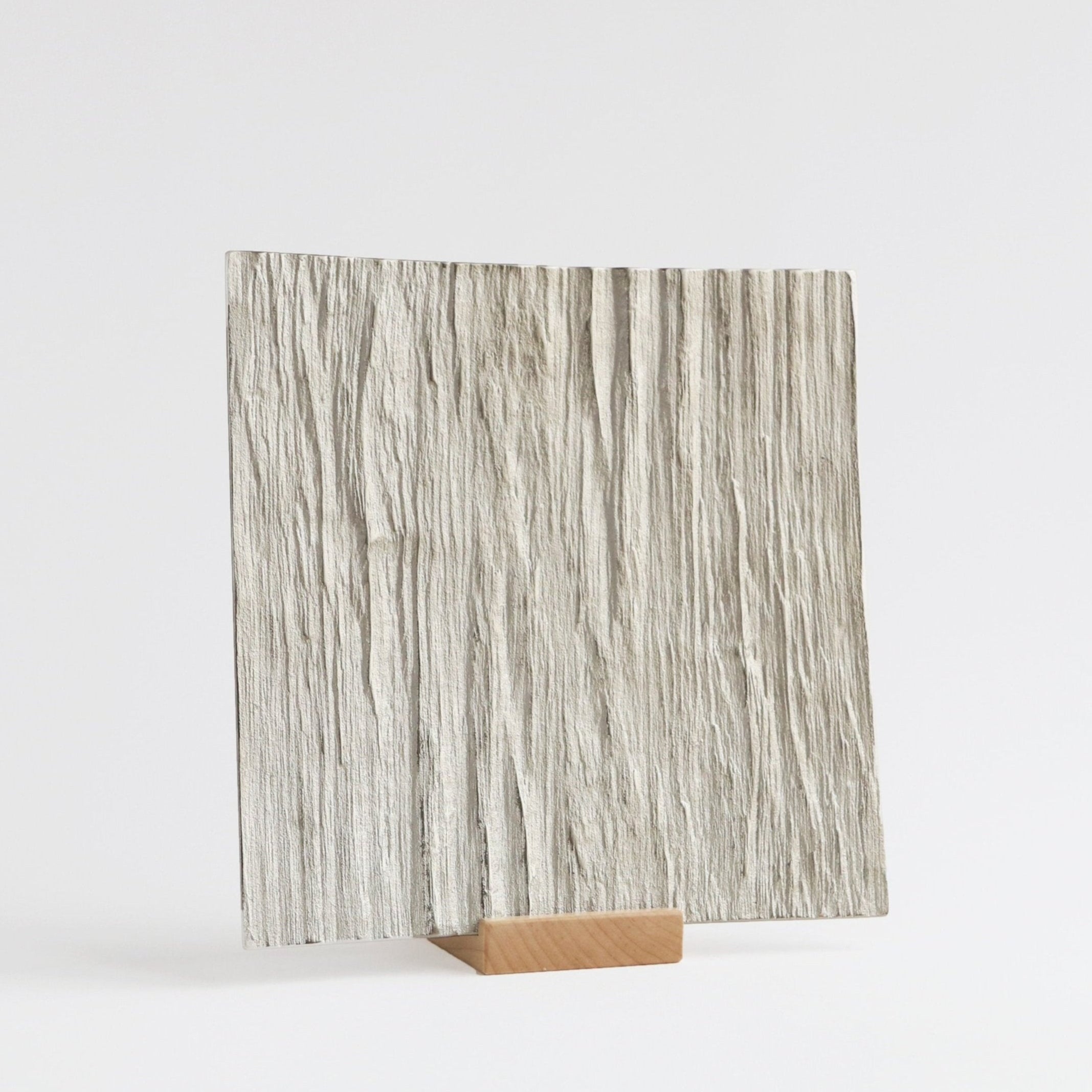 silver serving tray with wood texture