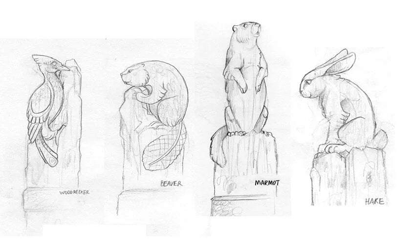 Pencil sketches of animal statues on a white background