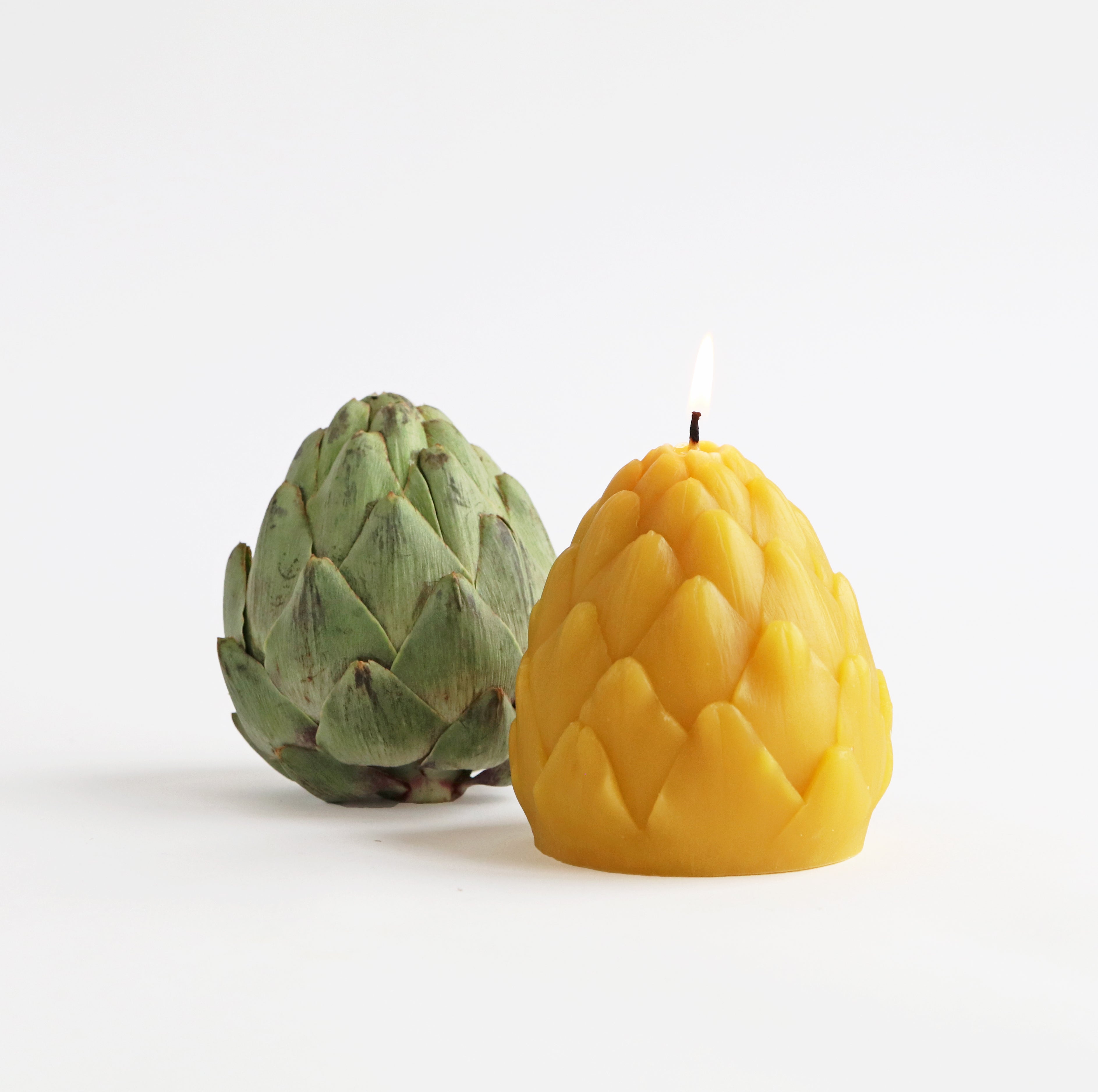candle with an artichoke