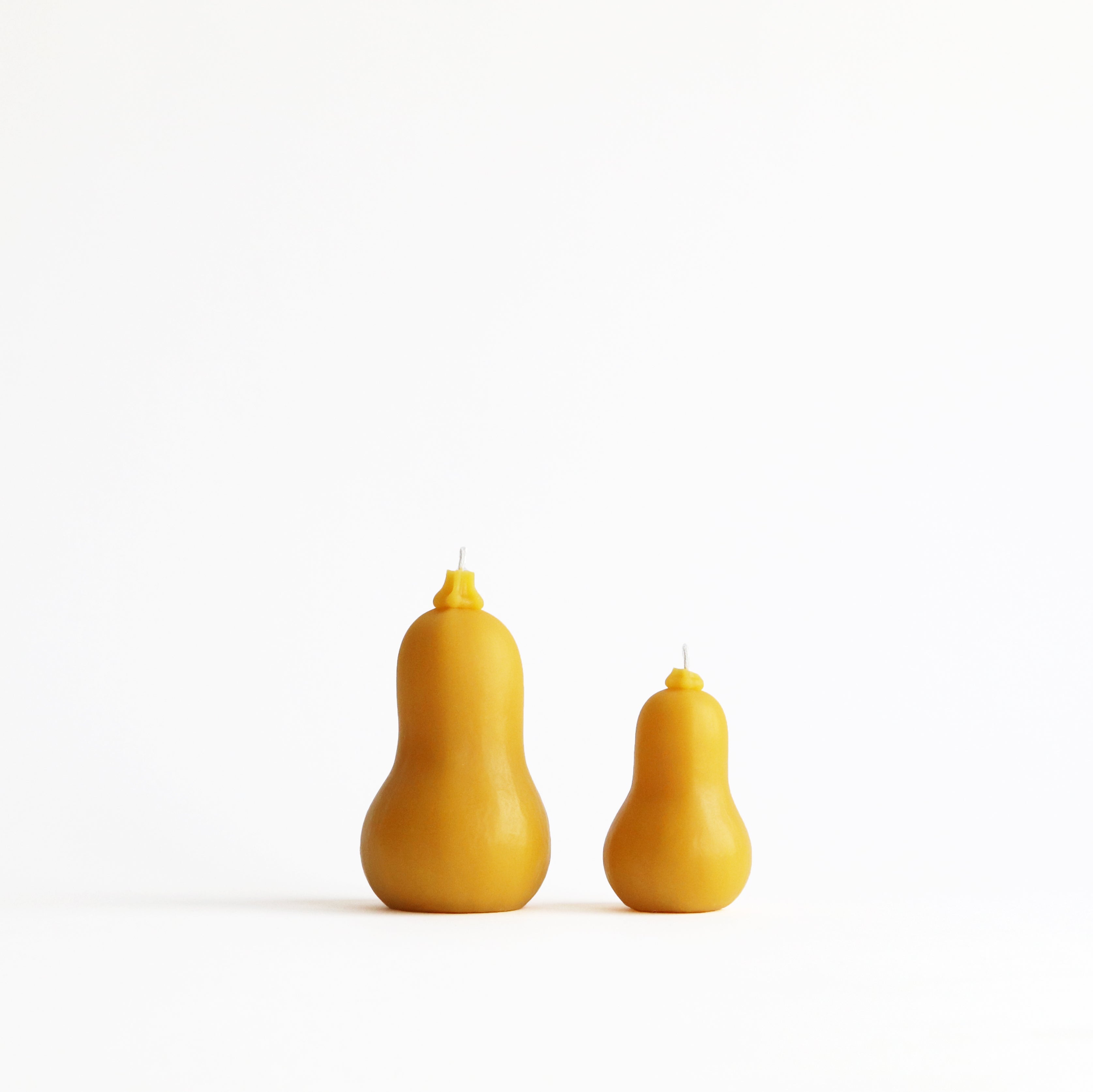 large and small butternut candles