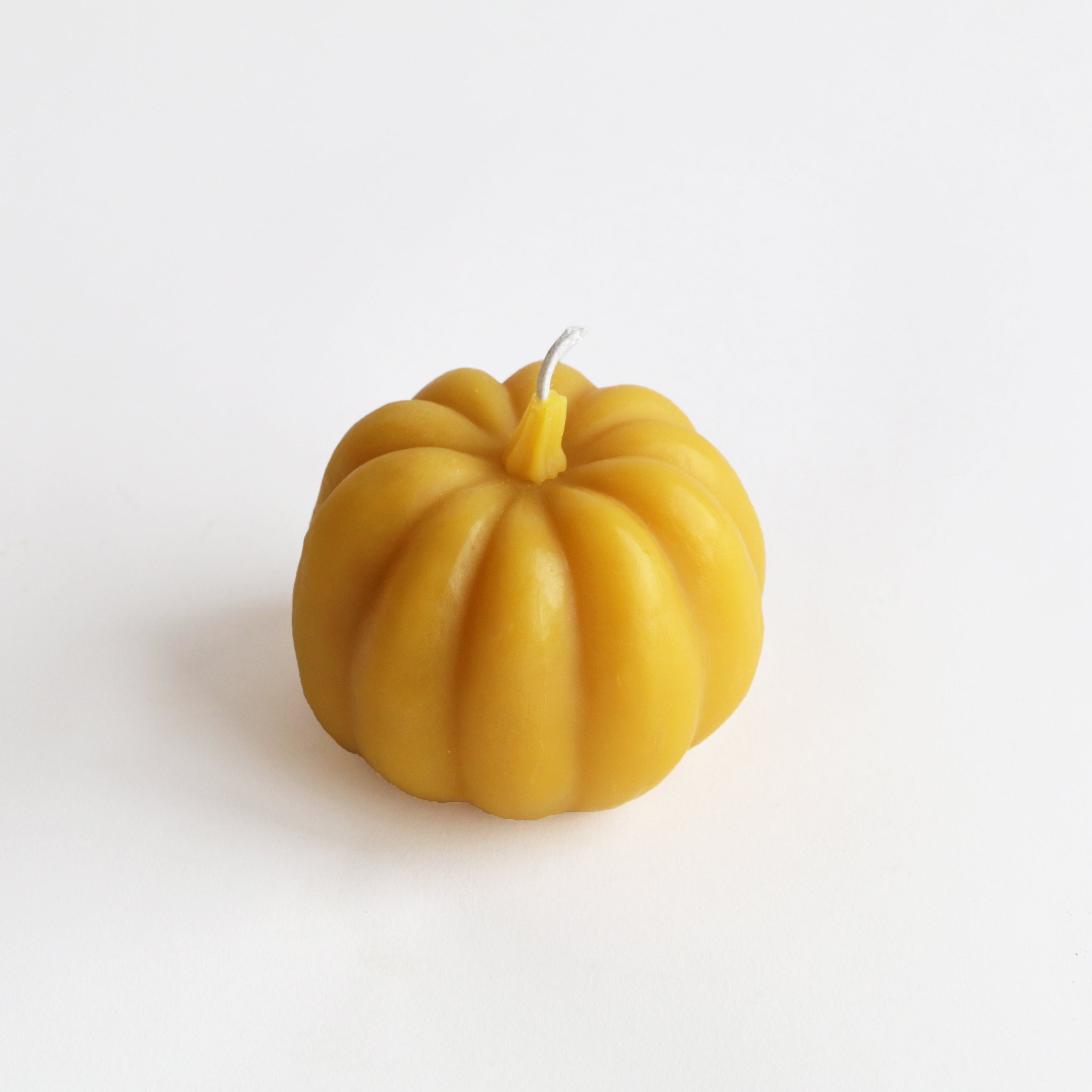 carnival squash candle