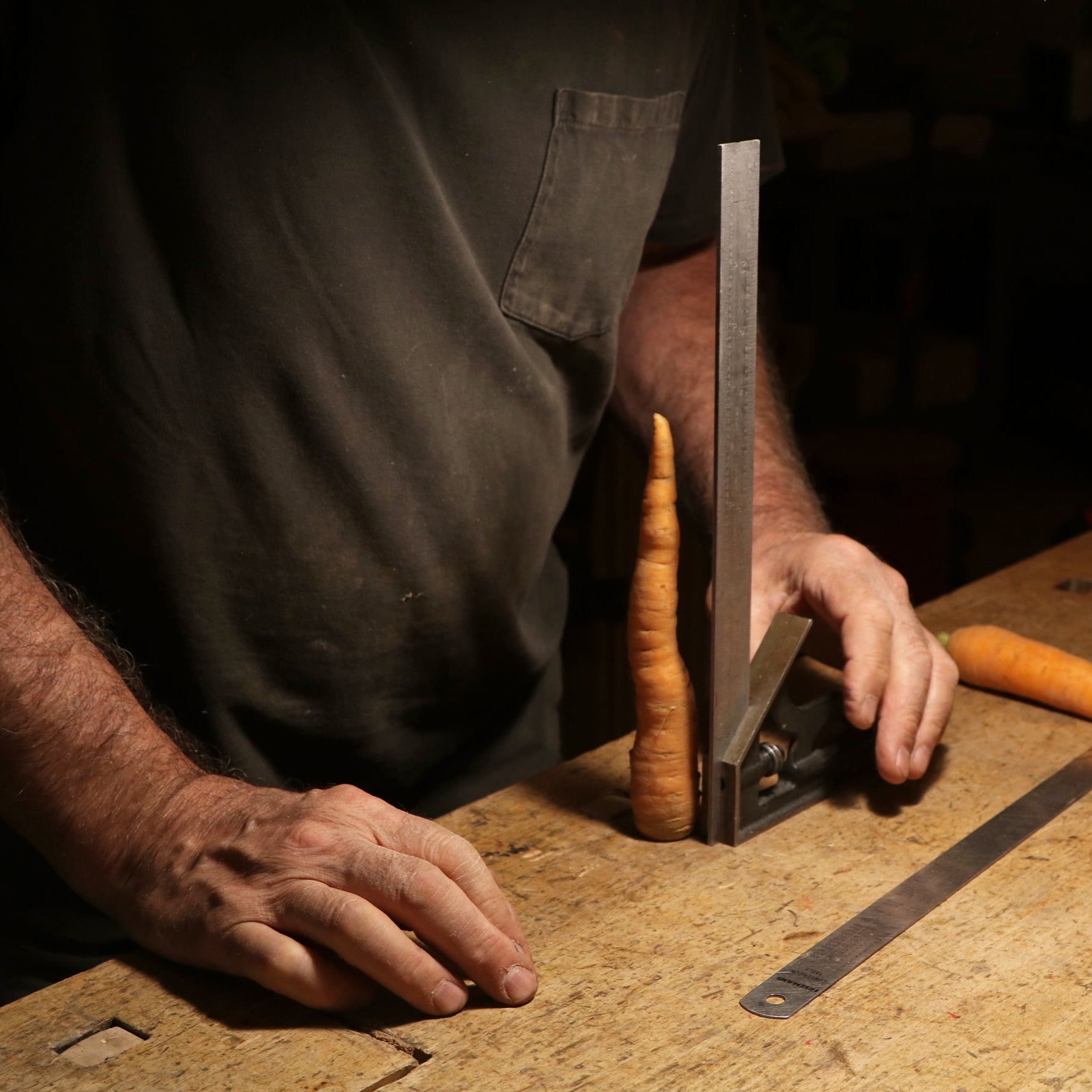 hands working on carrot candle mold