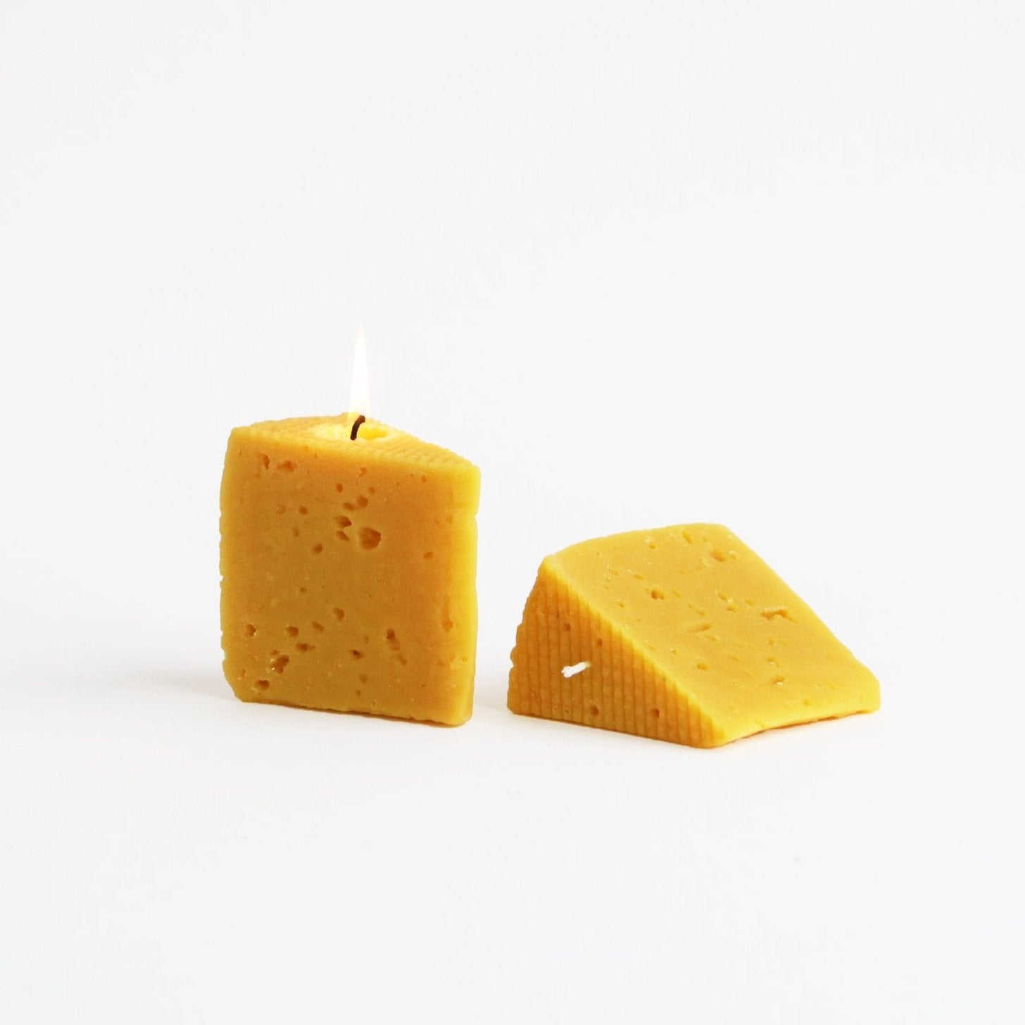 two beeswax cheese candles