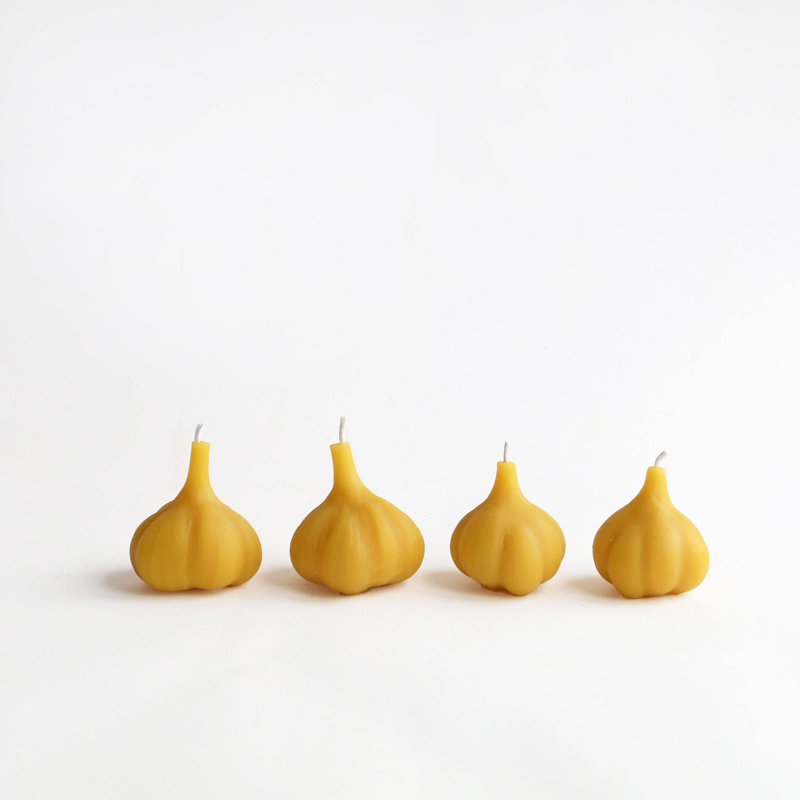 set of 4 garlic bulb beeswax candles