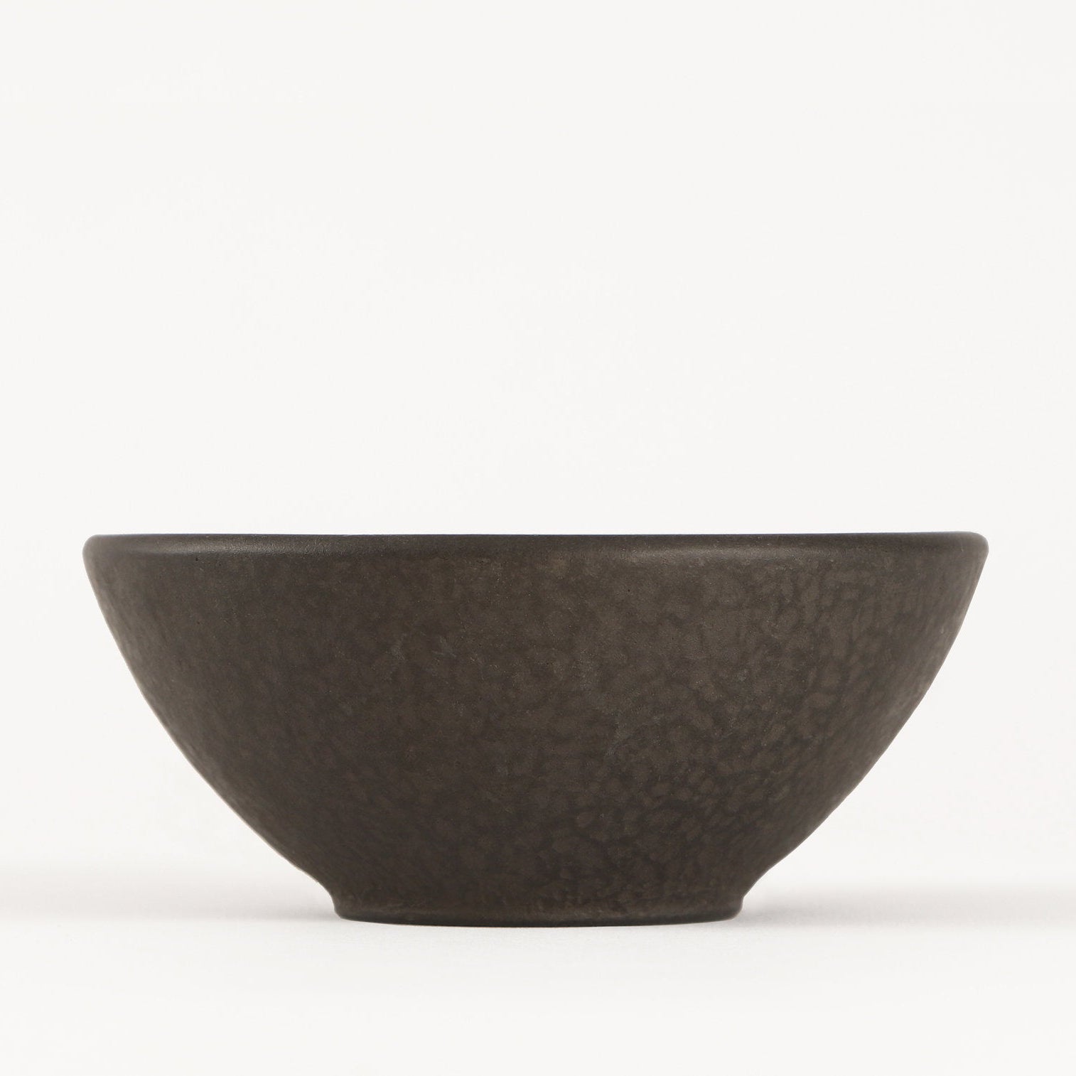 textured small metal bowl from side