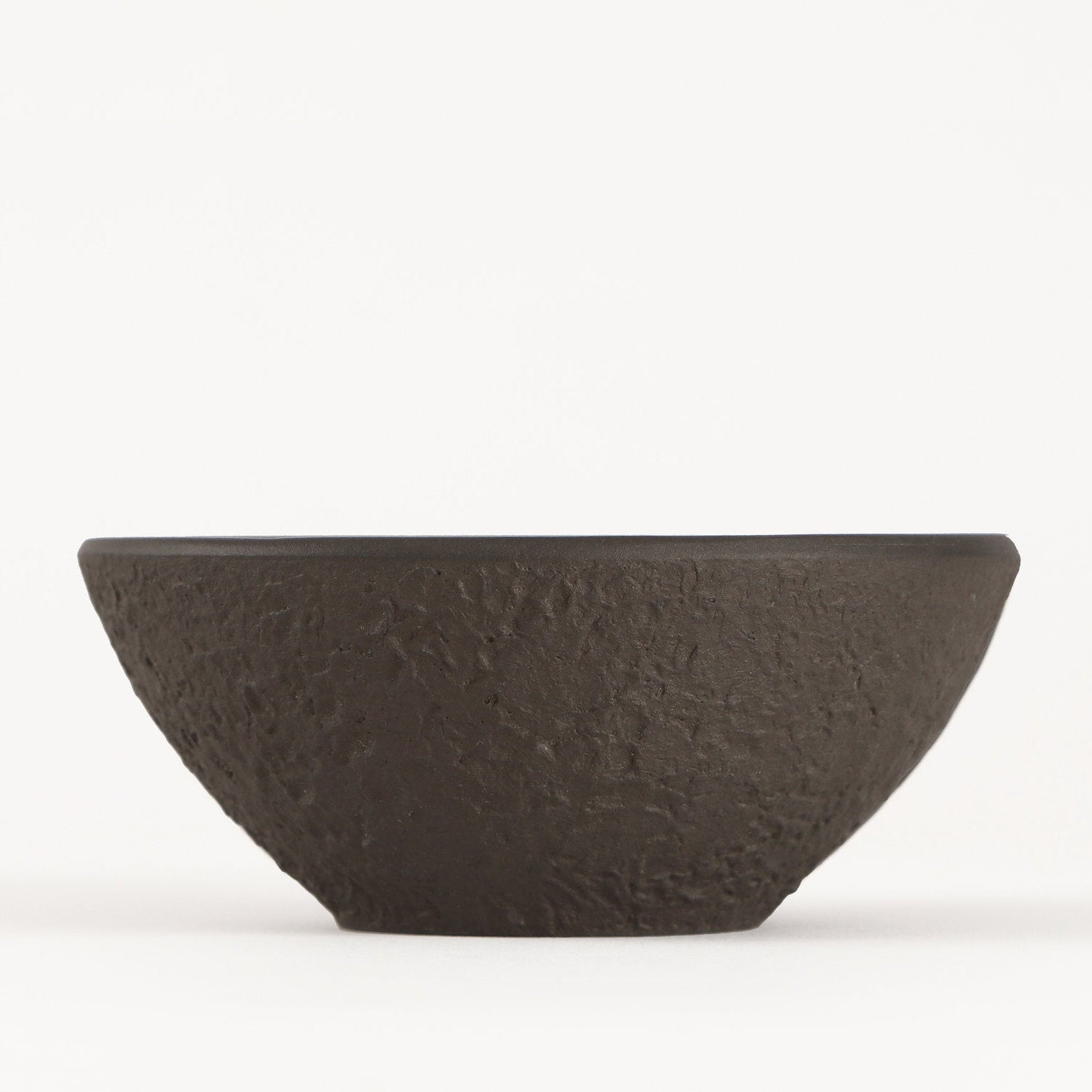 textured small stone metal bowl from side