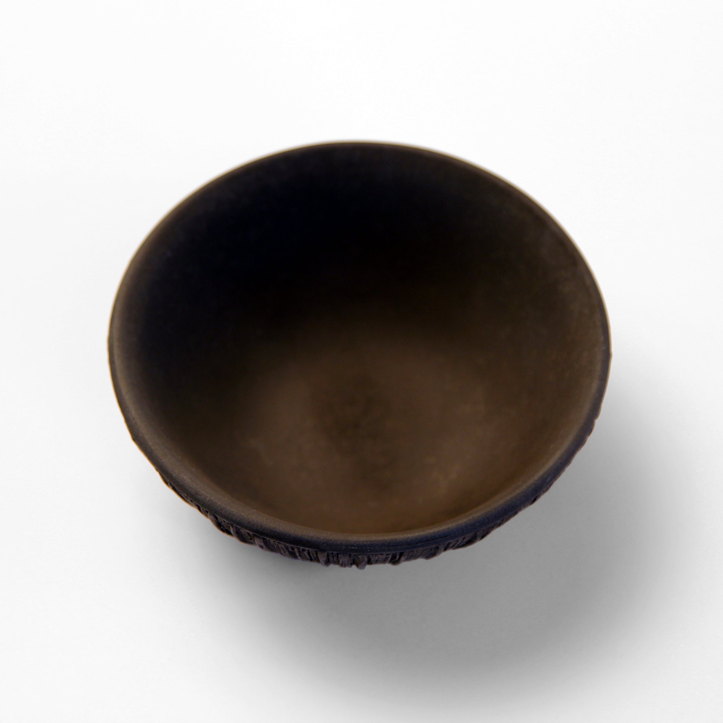 inside of small metal bowl splitwood texture