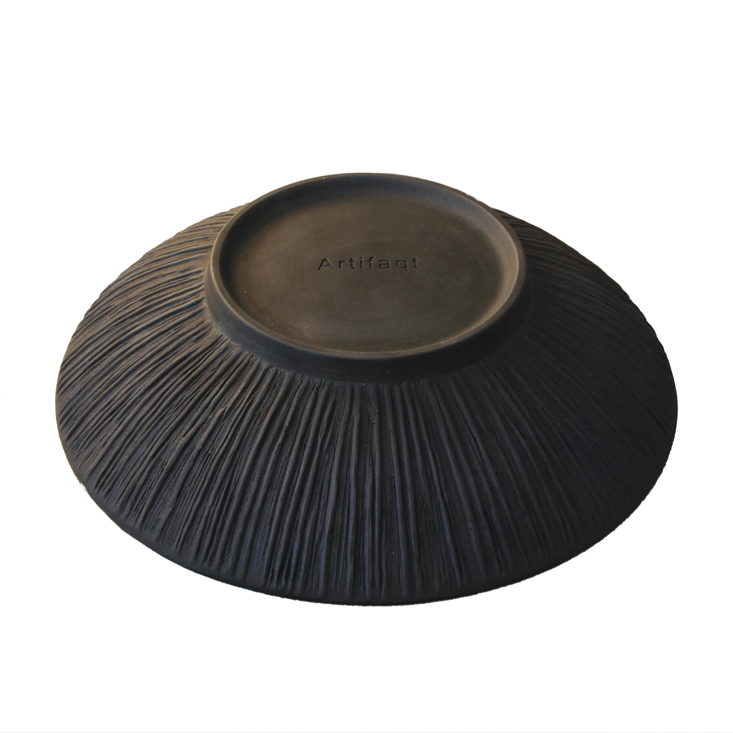 textured bottom of metal serving bowl
