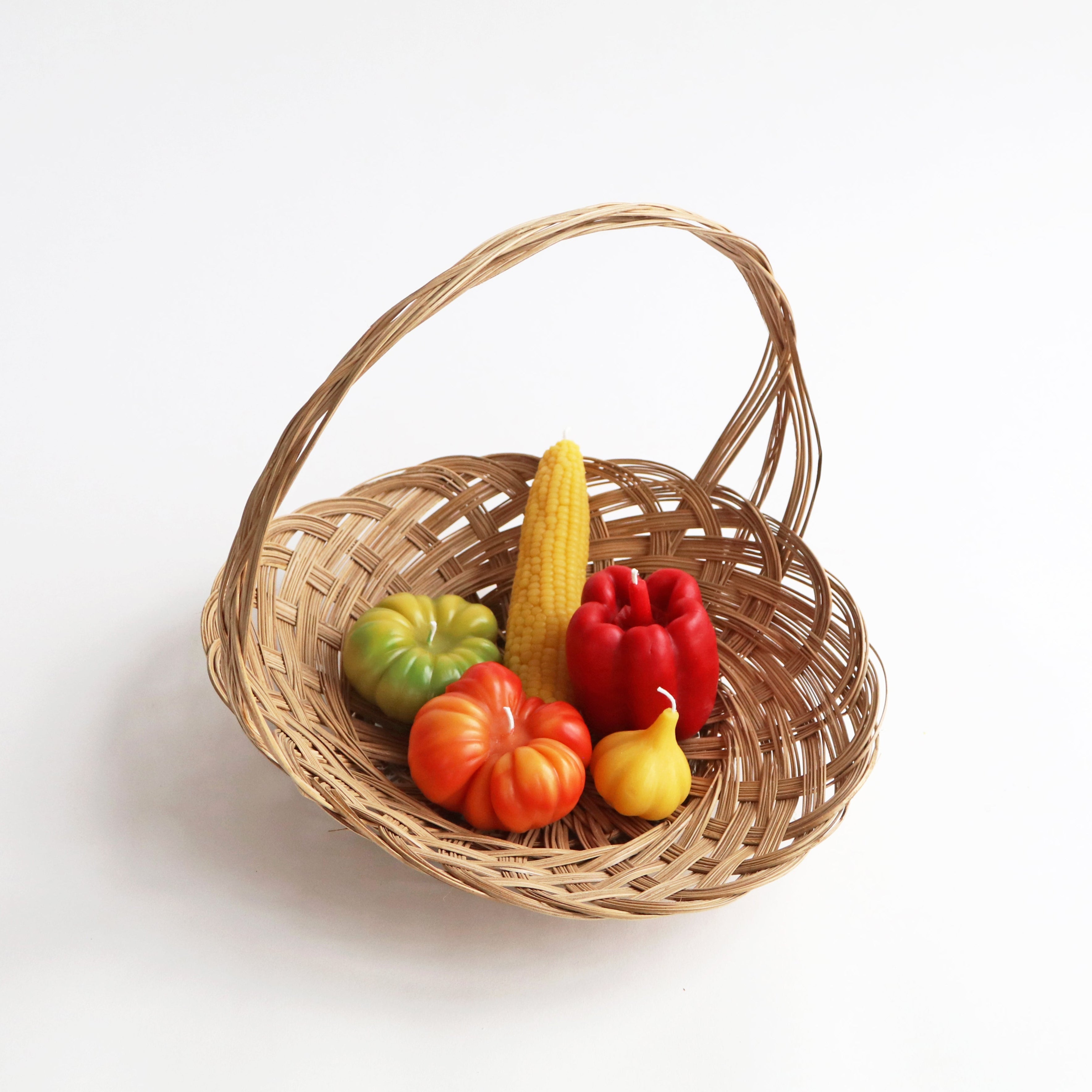 summer harvest beeswax candles in basket